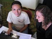 Two women participating in training workshop.